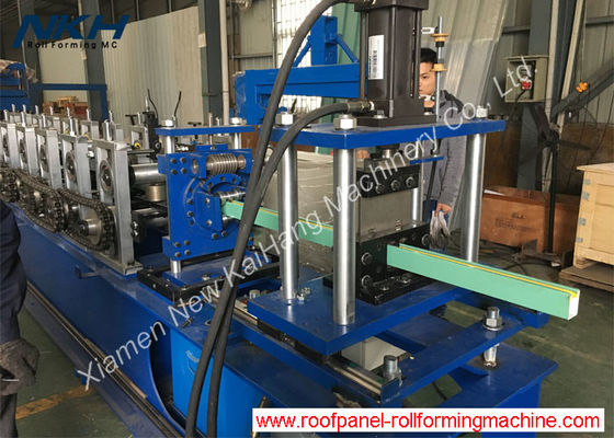 comprar Rolo do corrimão da porta do silêncio que forma a máquina / rolo de aço do perfil que forma a máquina online manufacture